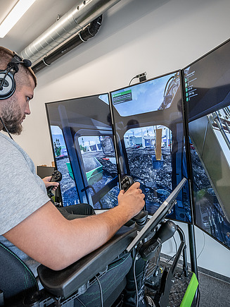 Lehrling auf Baumaschinensimulator